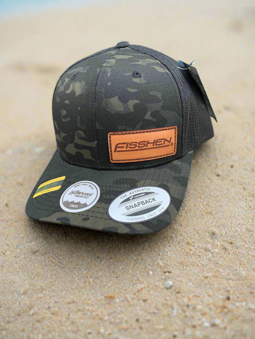 Camo Trucker Hat snapback with left centre leather patch with laser Engraved Fisshen Logo mesh back with adjustable strap