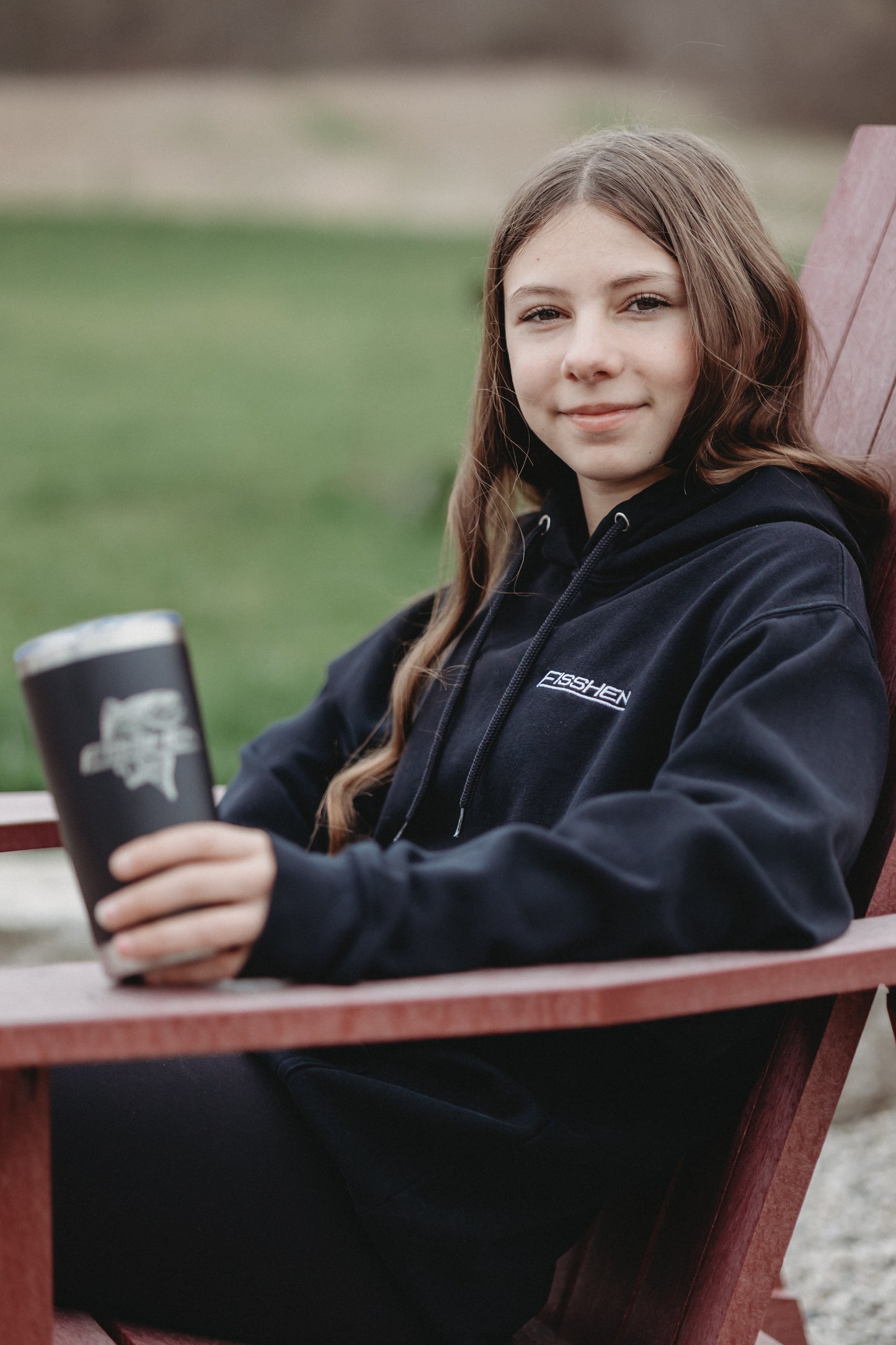 Black tumbler cup with fisshen co logo engraved on the front