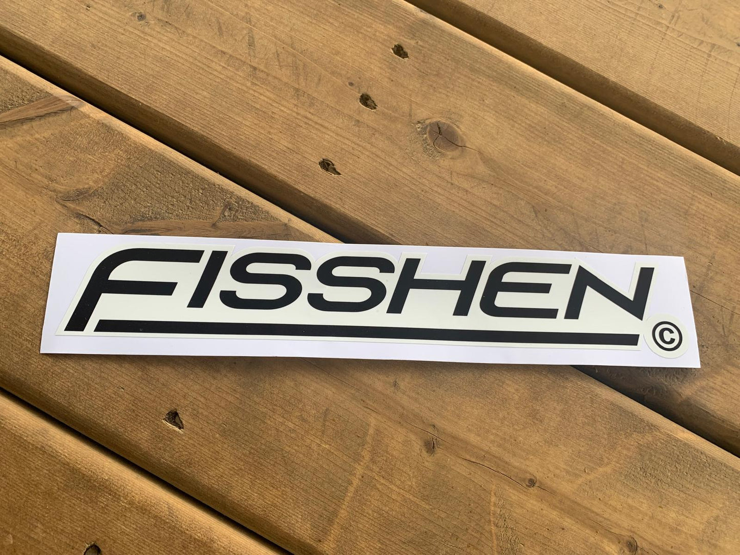 Vinyl Sticker, fisshen in black with white cut out background 